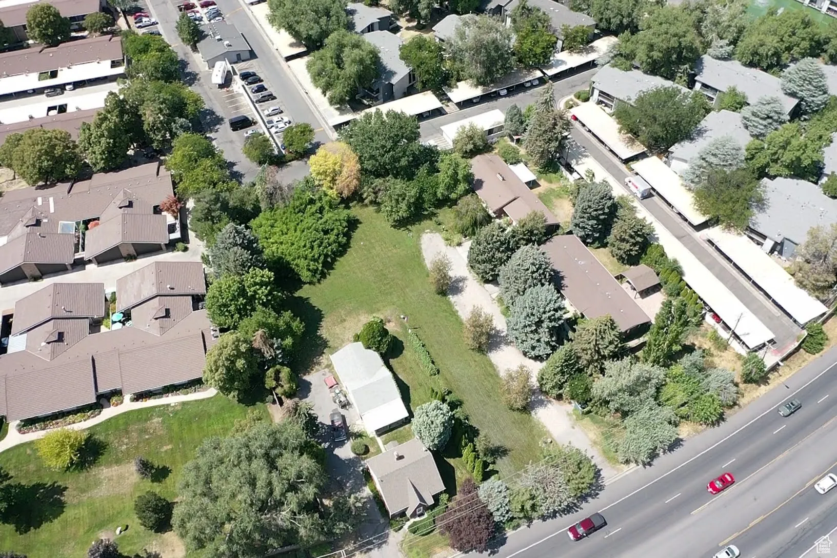 Aerial overview of property's location with nearby suburban area