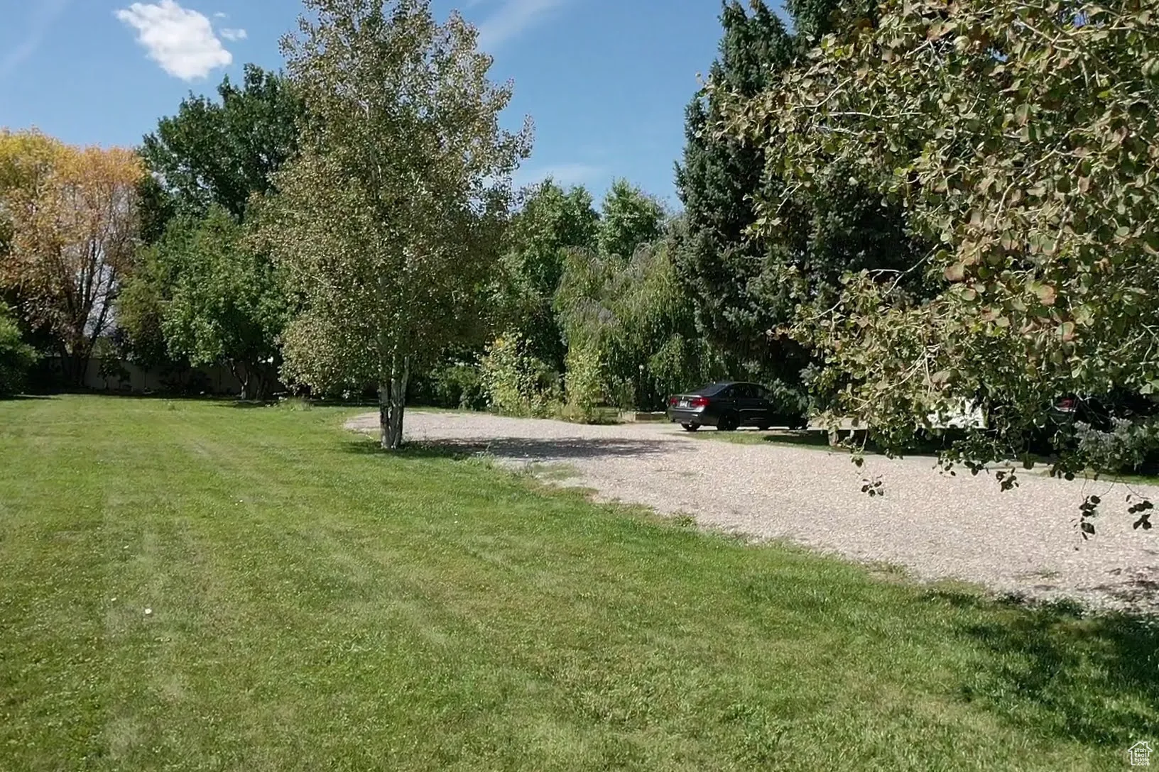 View of property's community featuring a yard