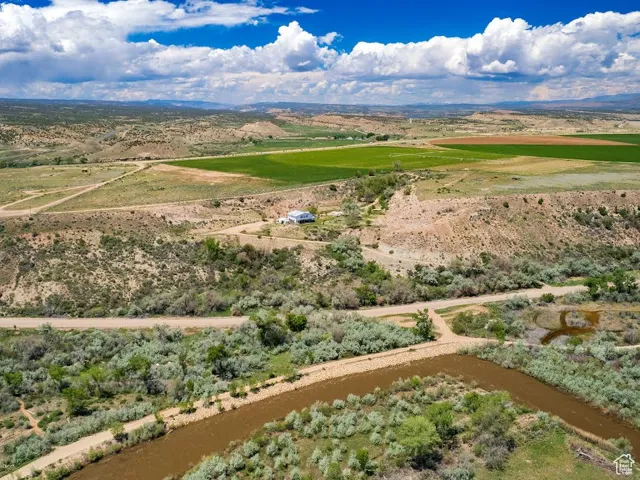 Overview of rural landscape featuring a nearby body of water
