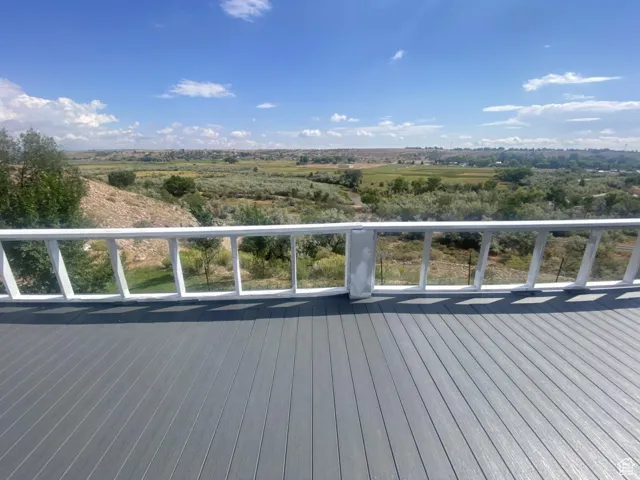 Wooden deck featuring a view of rural / pastoral area