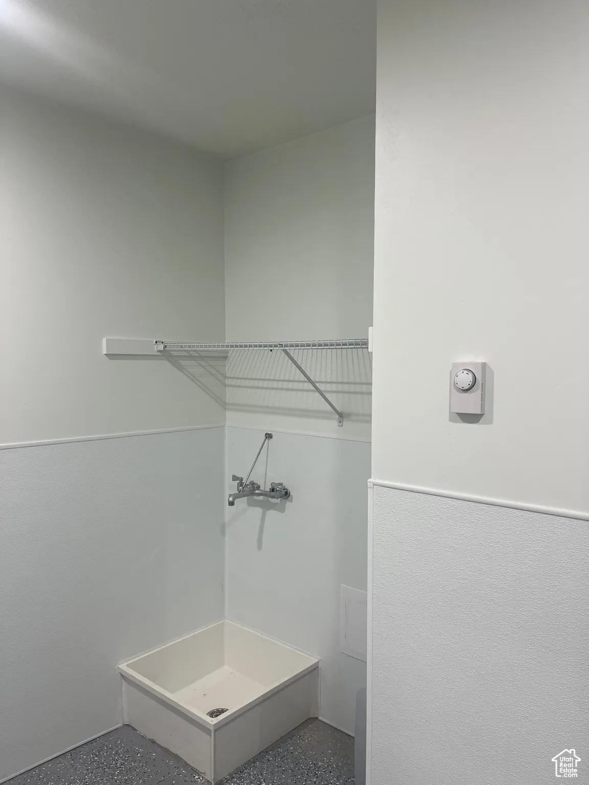 Bathroom with speckled floor