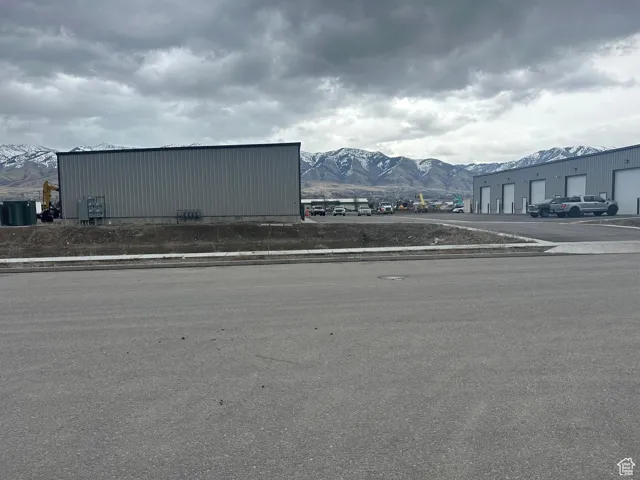 View of property with a mountain view