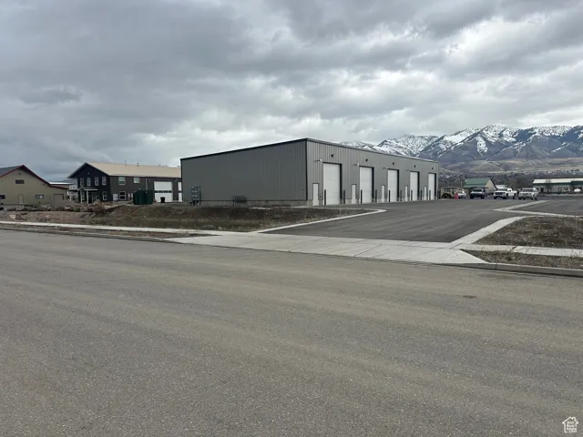 View of building exterior featuring a mountain view