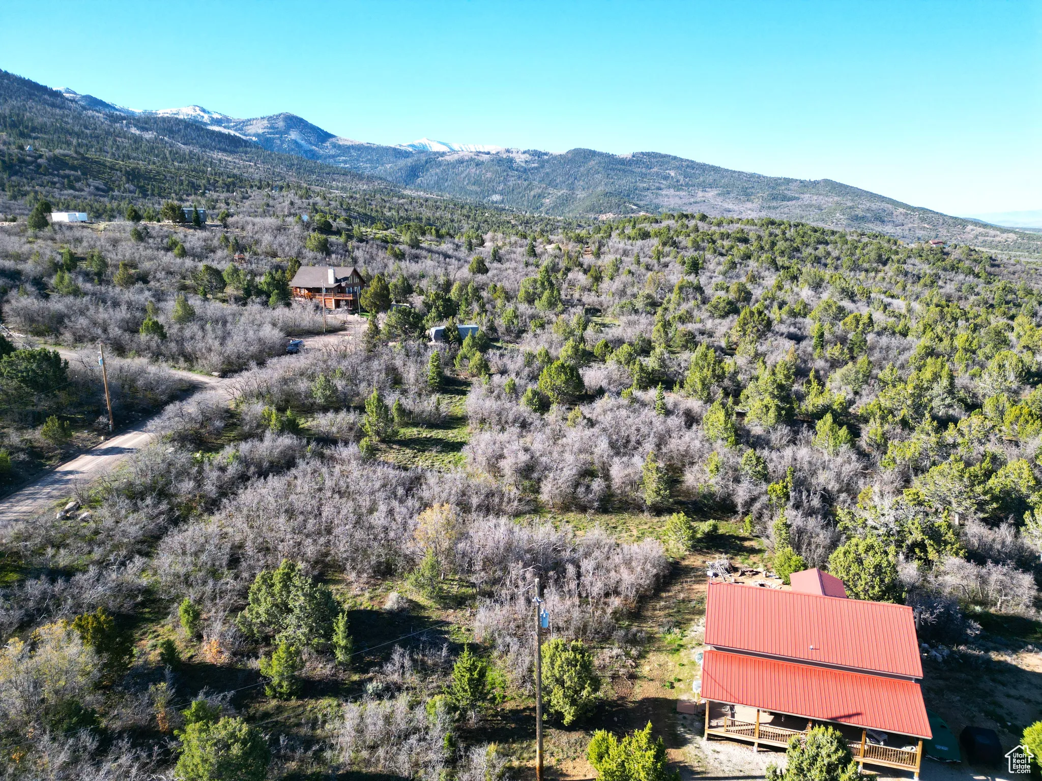 View from above of property with a mountainous background