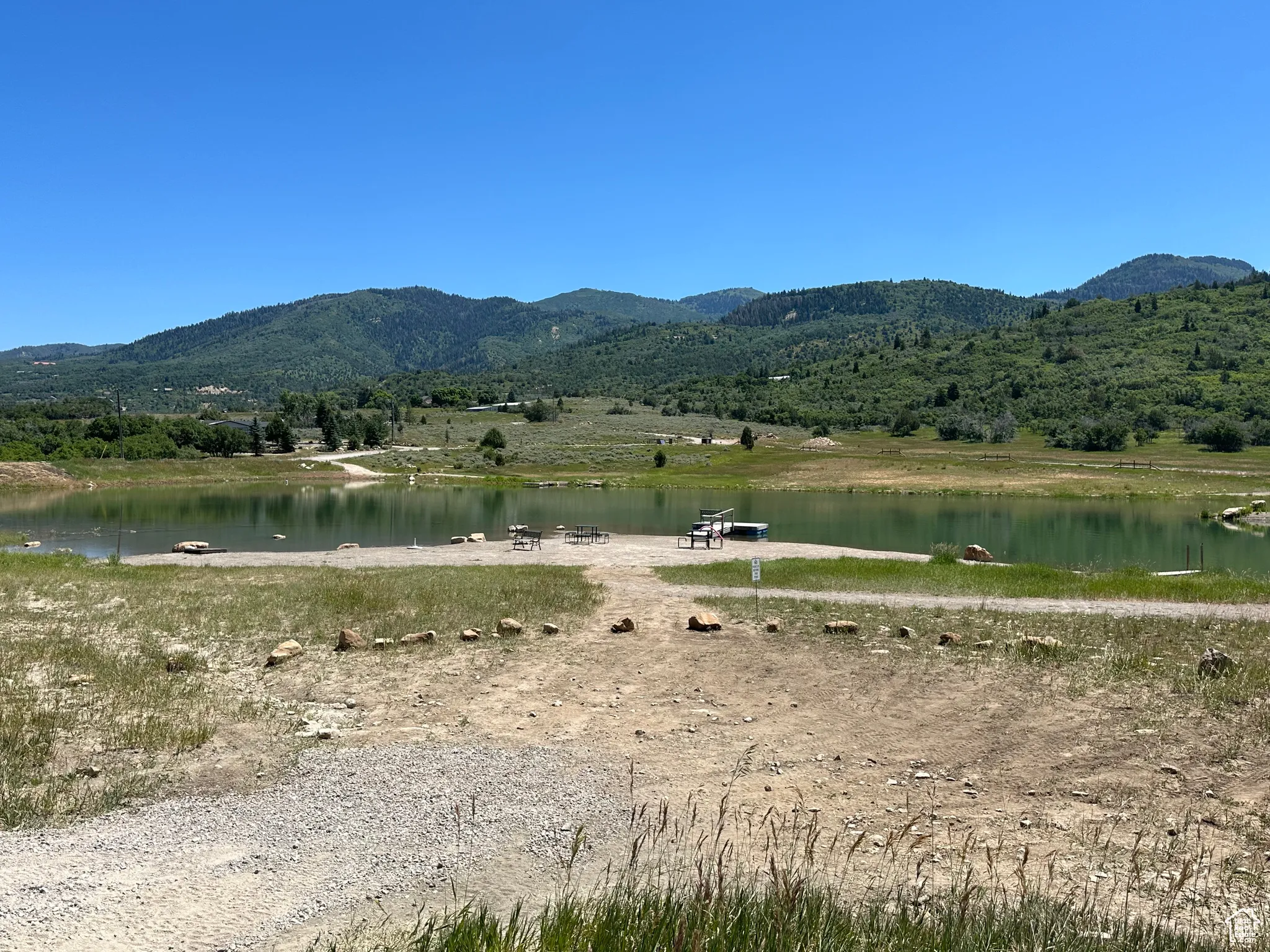 View of mountain backdrop with a large body of water