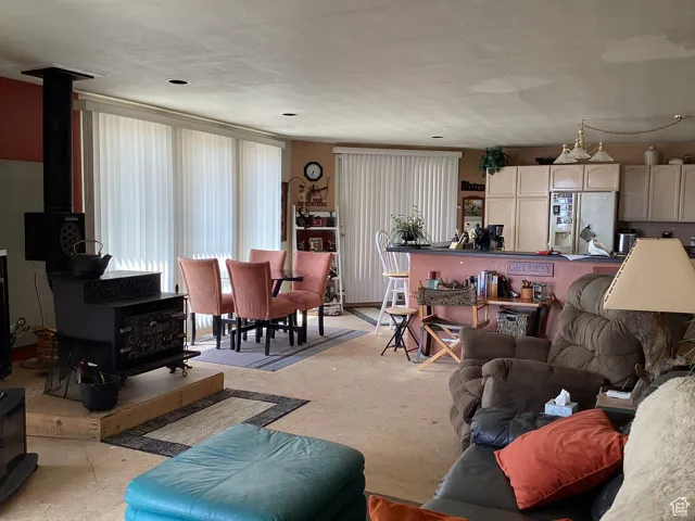 Living area featuring a wood stove