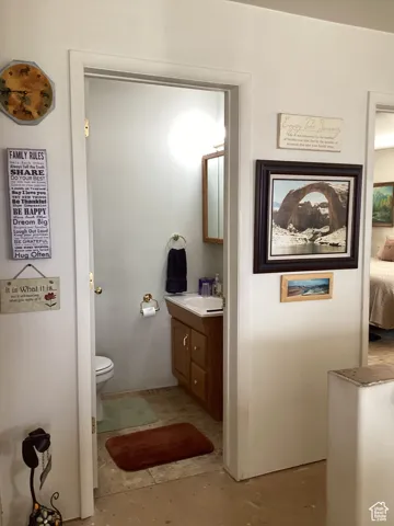 Bathroom featuring vanity and ensuite bath