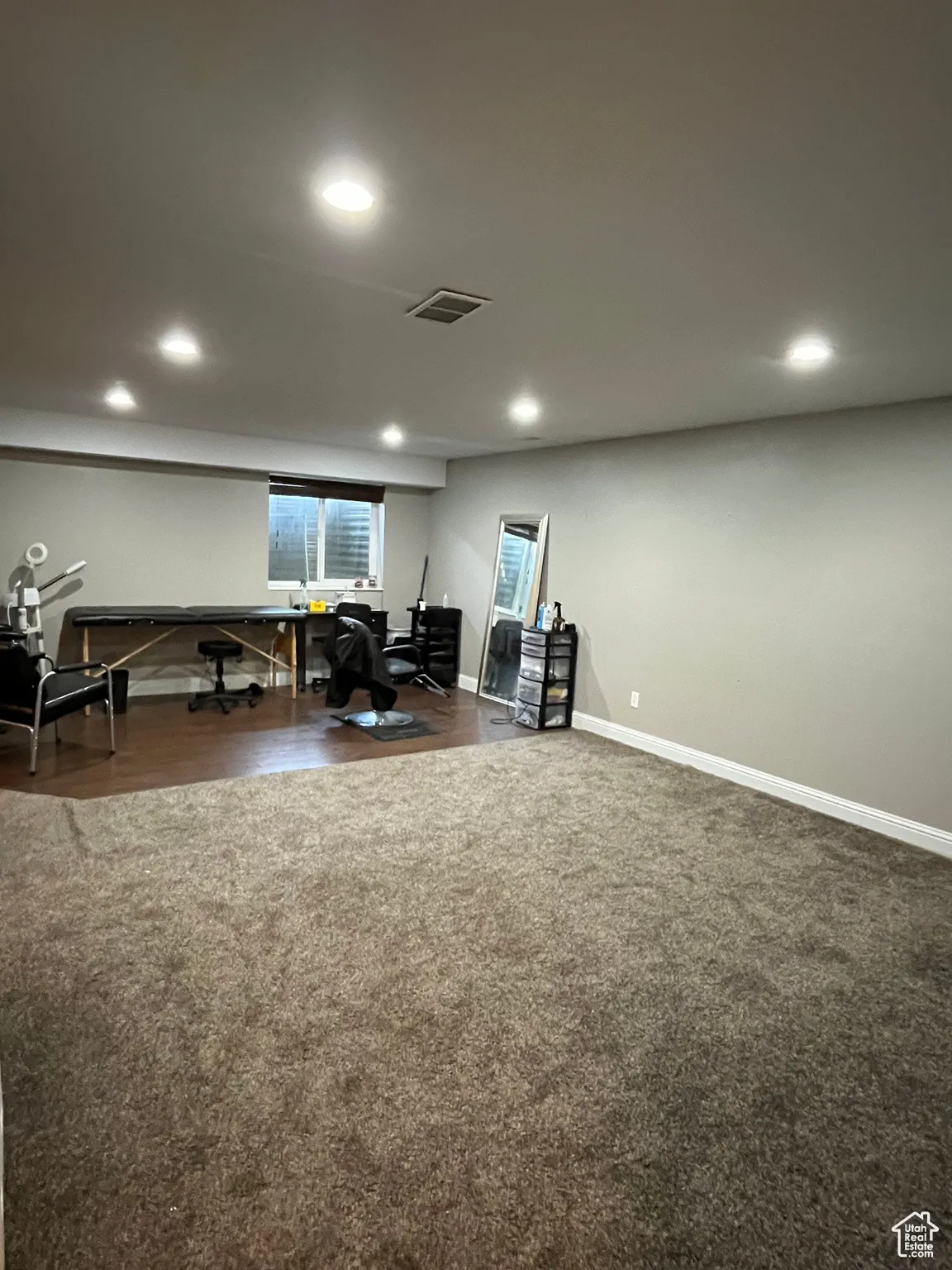 Living area featuring recessed lighting, an office area, and is plumbed for a wet bar