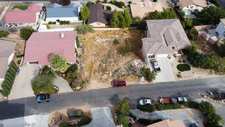 View of property location with nearby suburban area