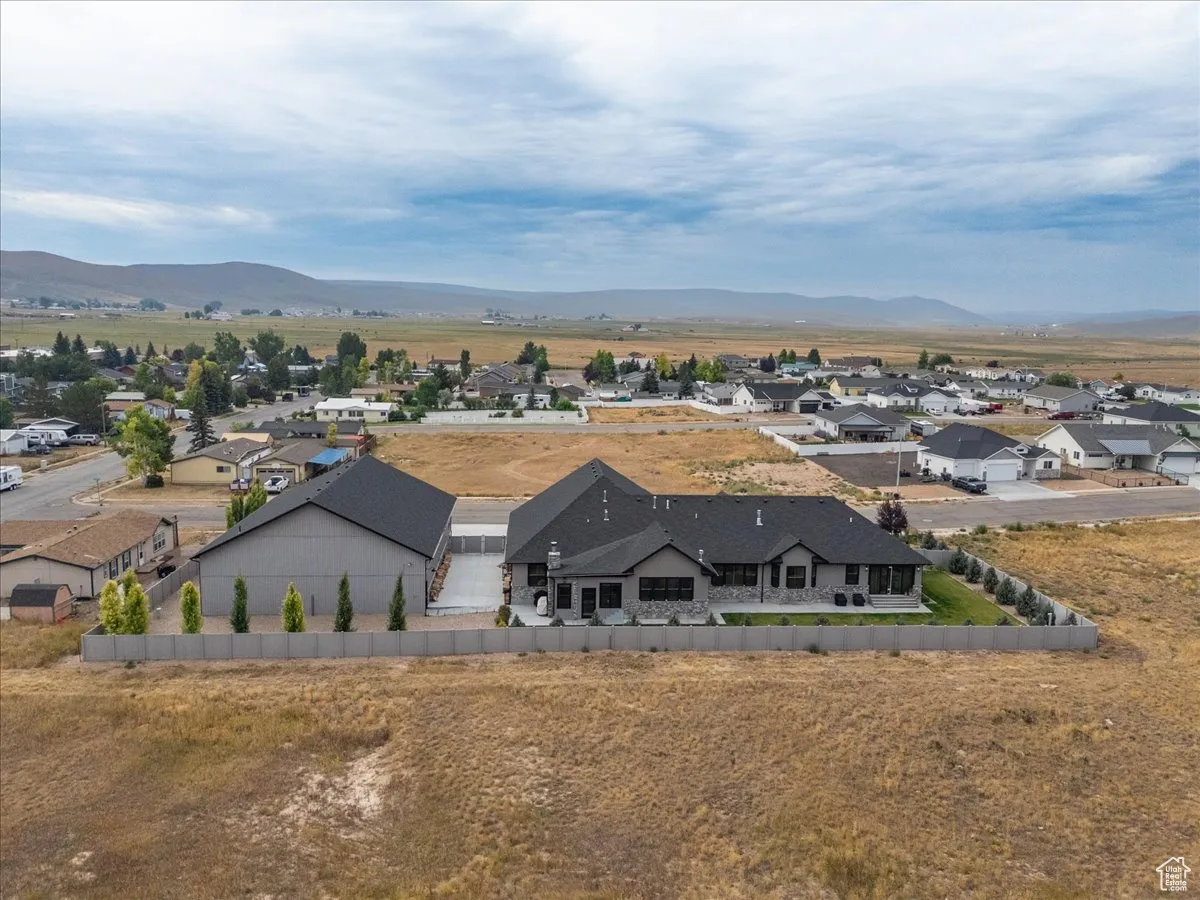 Aerial perspective of suburban area with mountains