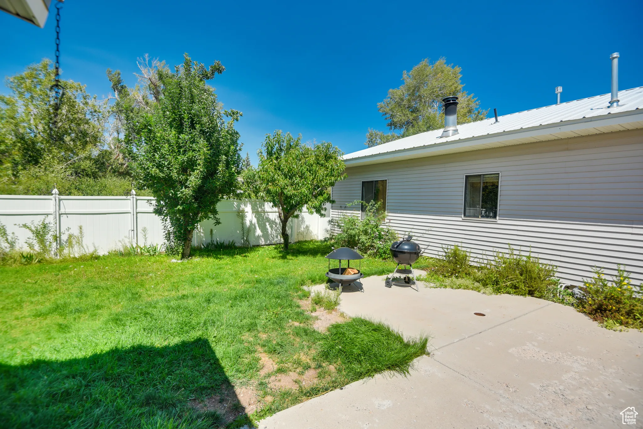 View of yard with a patio