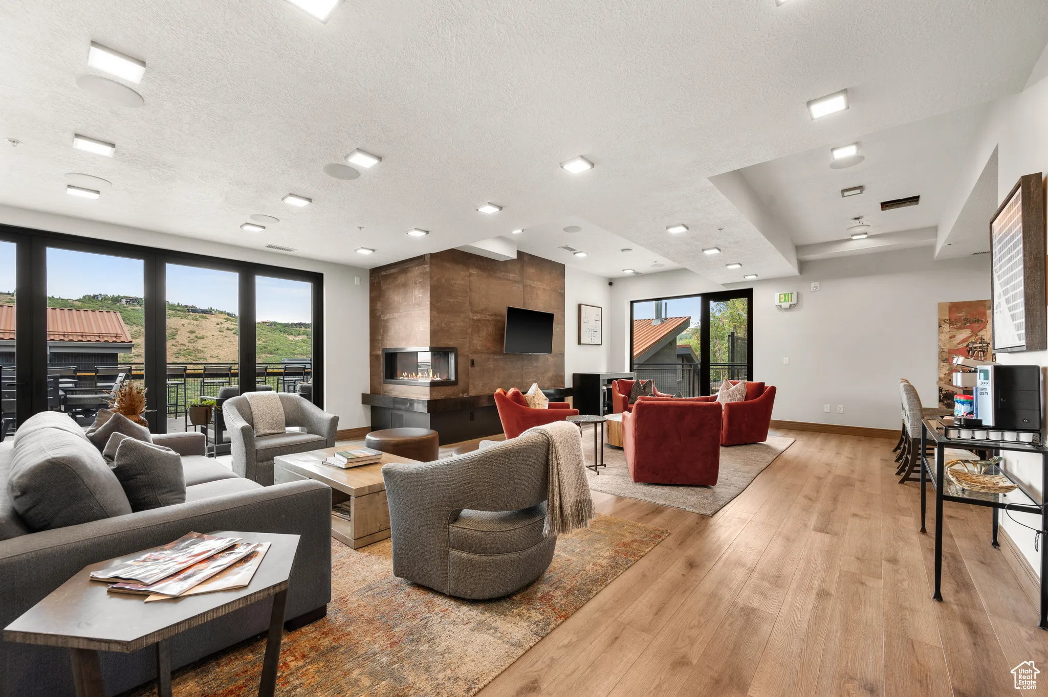 On the second floor is a lounge with a bartender during ski season.