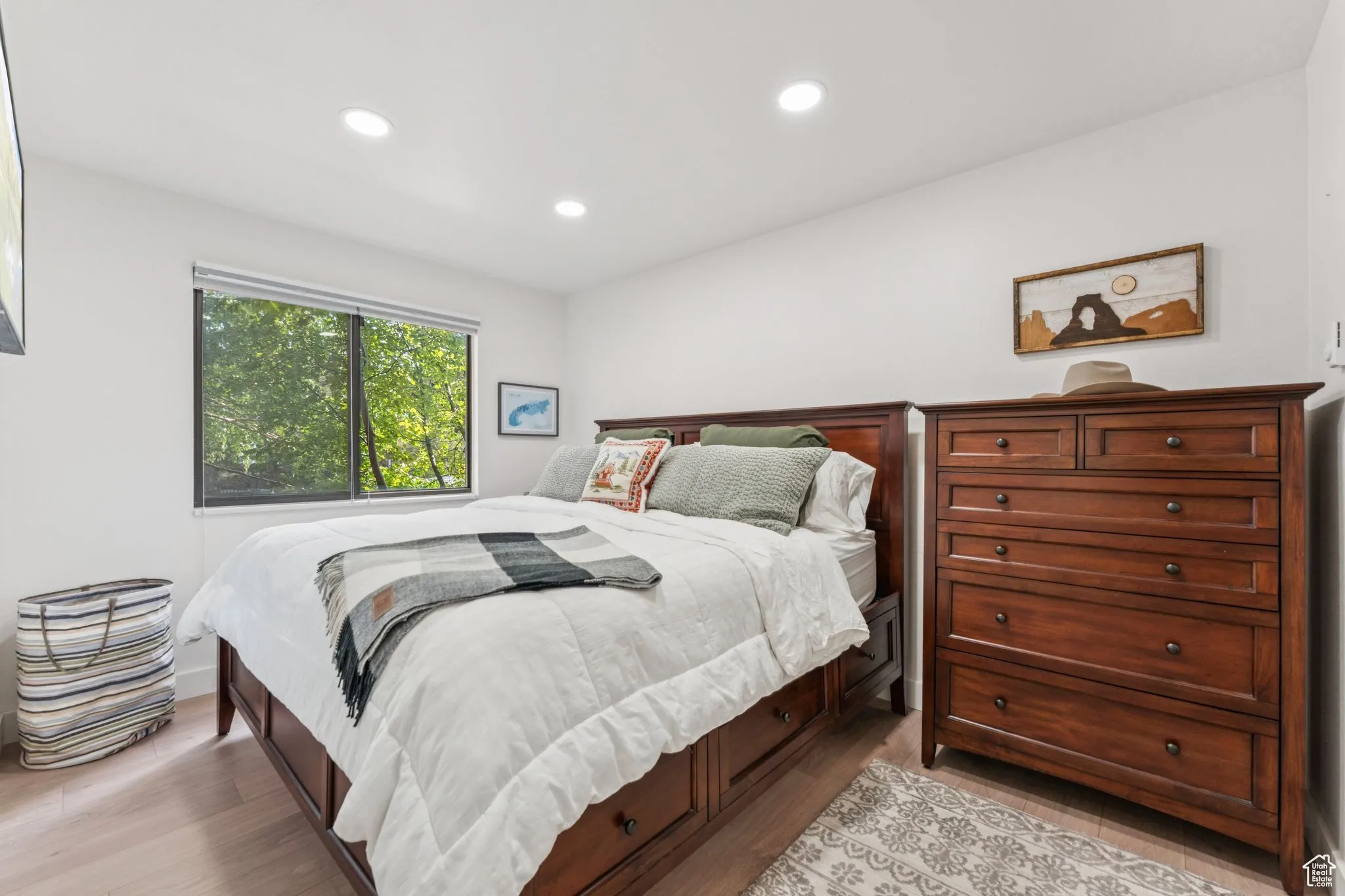 Bedroom with recessed lighting and light wood-style flooring