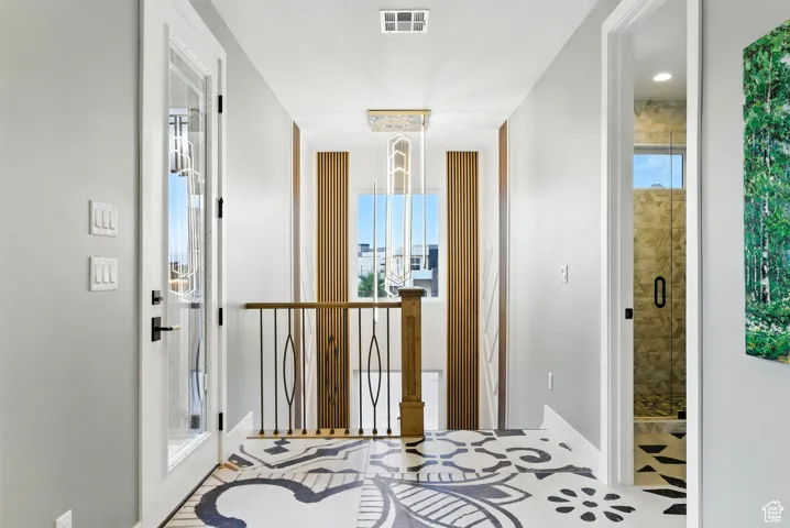 Hallway with dramatic tile.