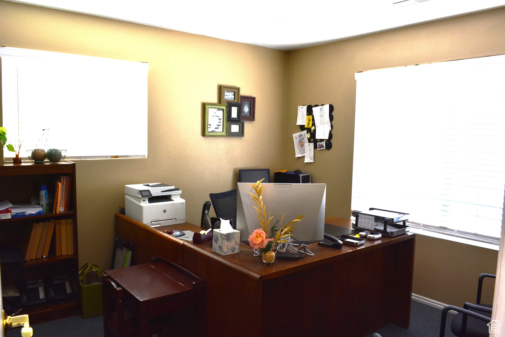 Office featuring dark colored carpet