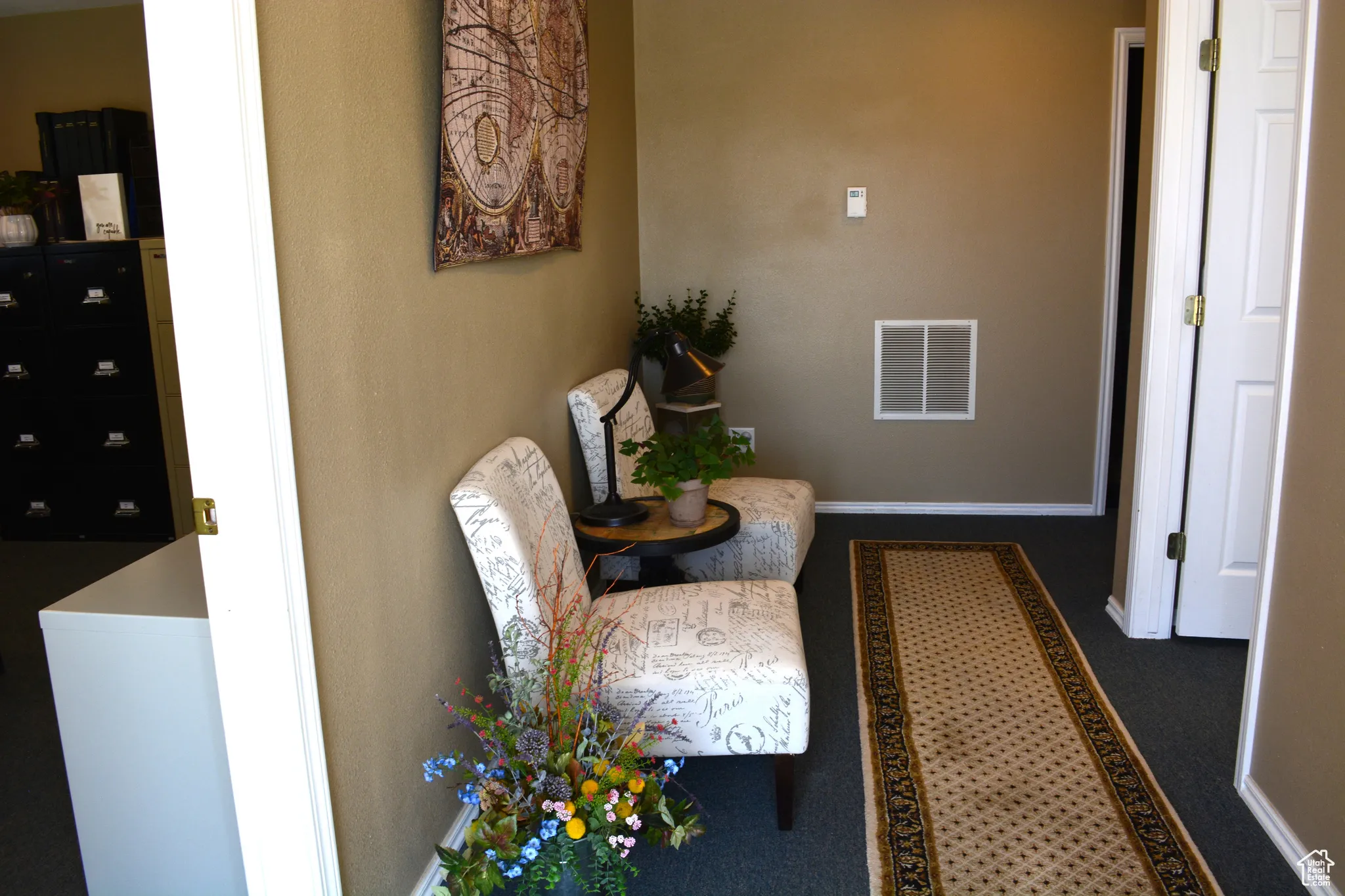 Corridor featuring baseboards