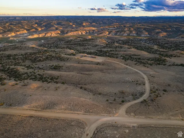 Aerial view of property and surrounding area with rural landscape and a desert landscape