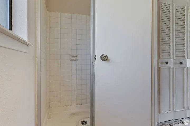 Full bathroom with a stall shower