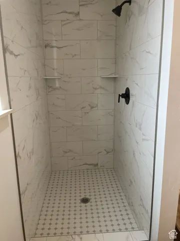 Bathroom featuring a stall shower
