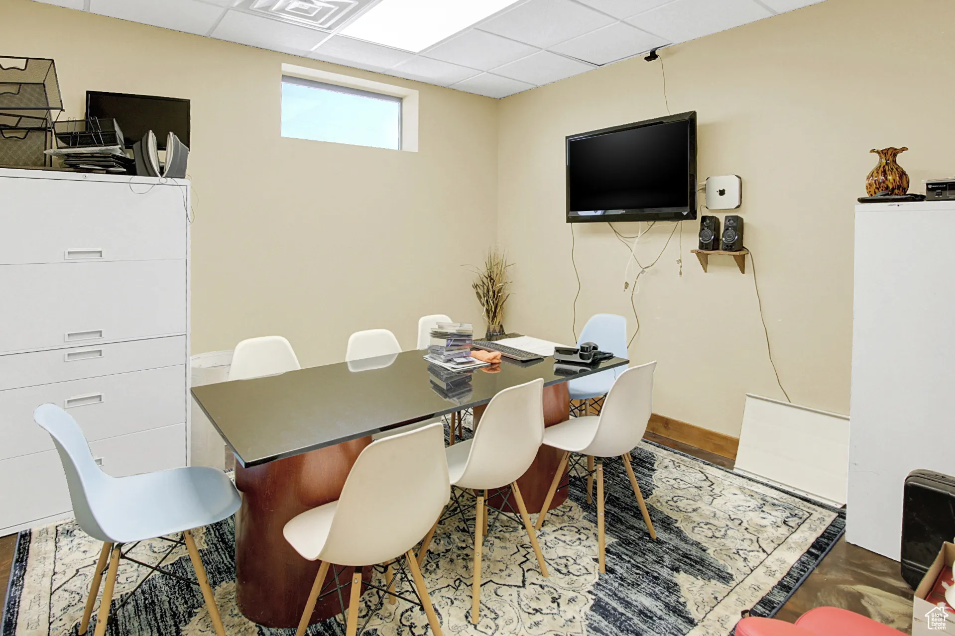 Dining space with a drop ceiling