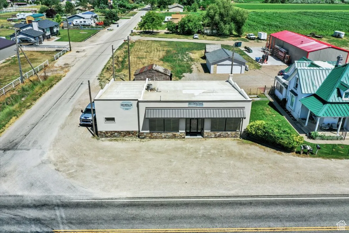 Overview of rural landscape featuring rows of crops