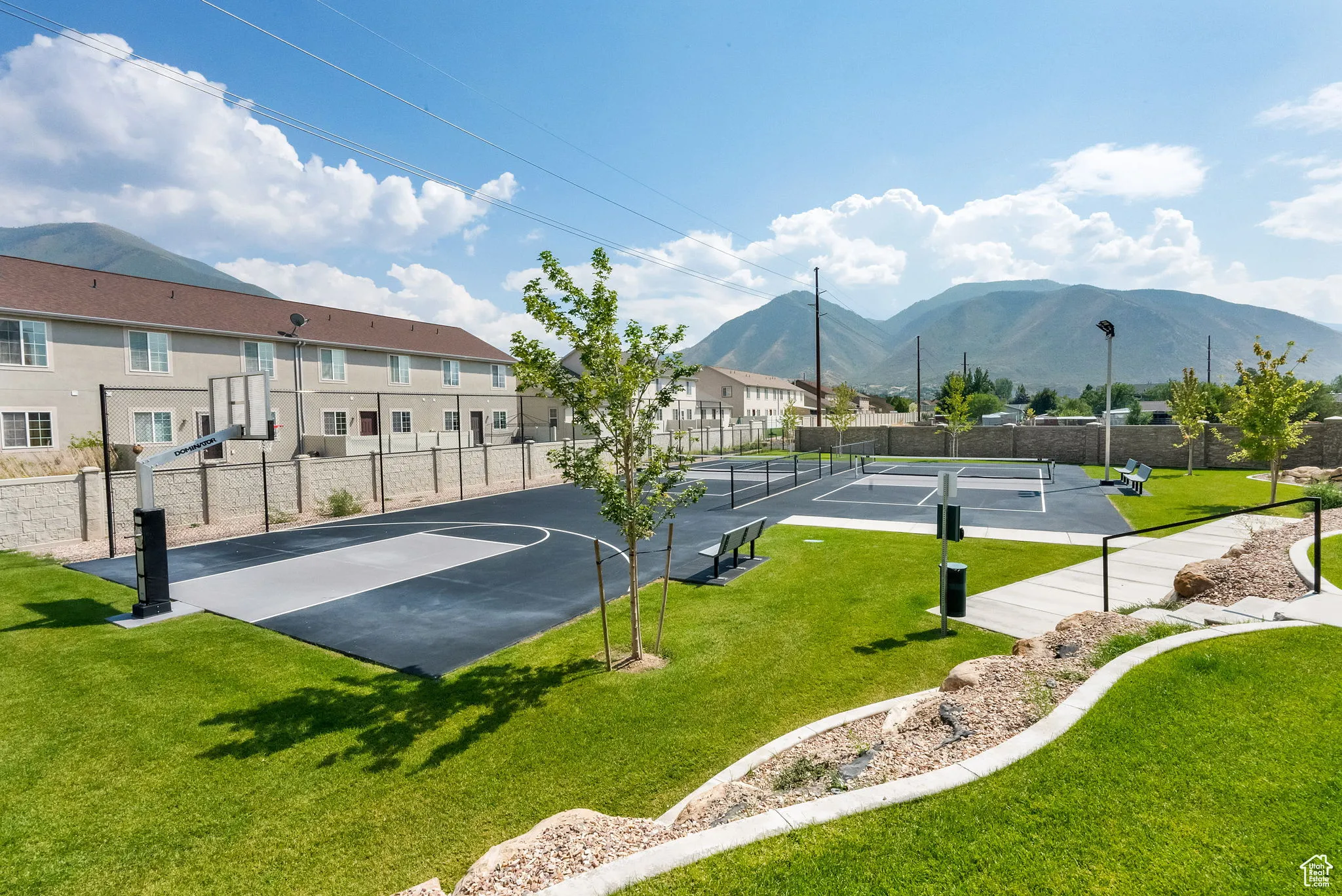 View of sport court featuring a mountain view, a residential view, and community basketball court