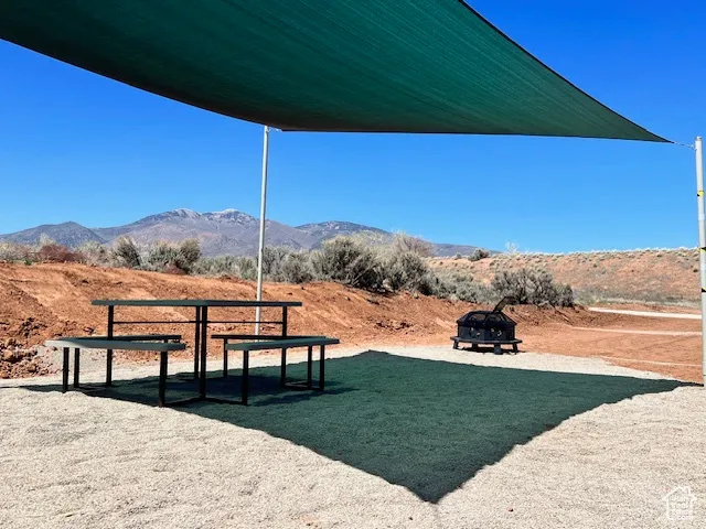Close-up of campsite with mountains in the background.