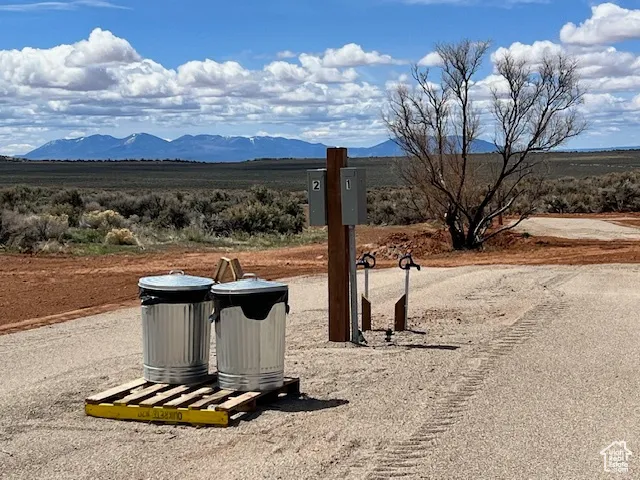 View of campsite with power, water and trash.