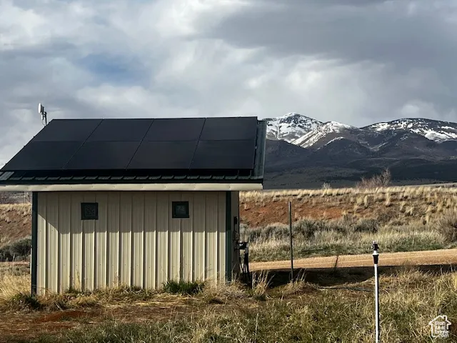 View of well house with solar on the roof.