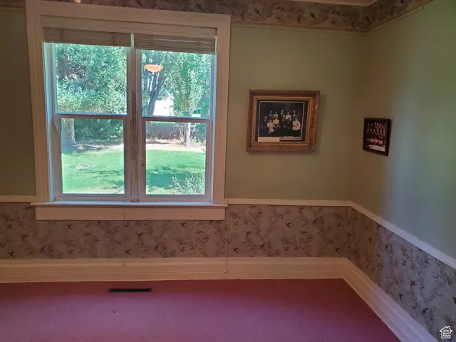 Detailed view of wallpapered walls