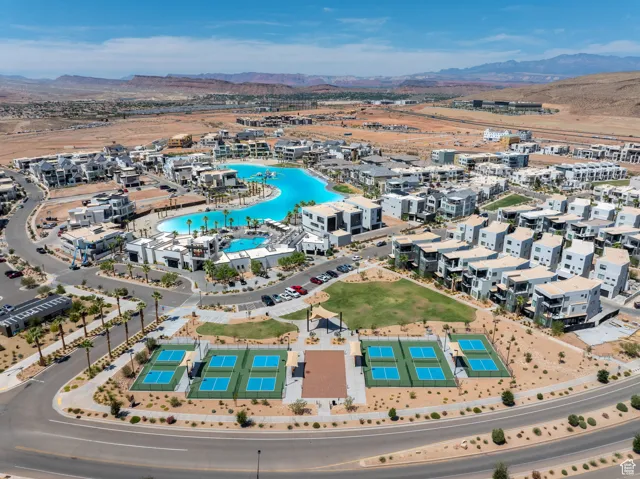View of lagoon, pool, and pickleball courts