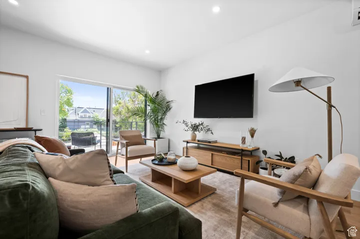 Living area featuring recessed lighting and wood finished floors