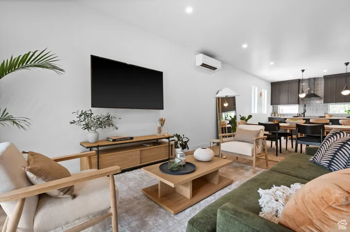 Living area featuring recessed lighting and light wood-style floors