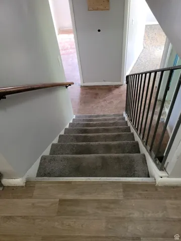 Stairs to 1st level basement