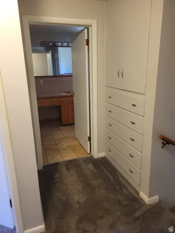 Upper Landing looking at built-in cabinets andbathroom