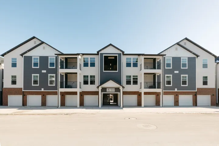 View of front facade featuring brick siding