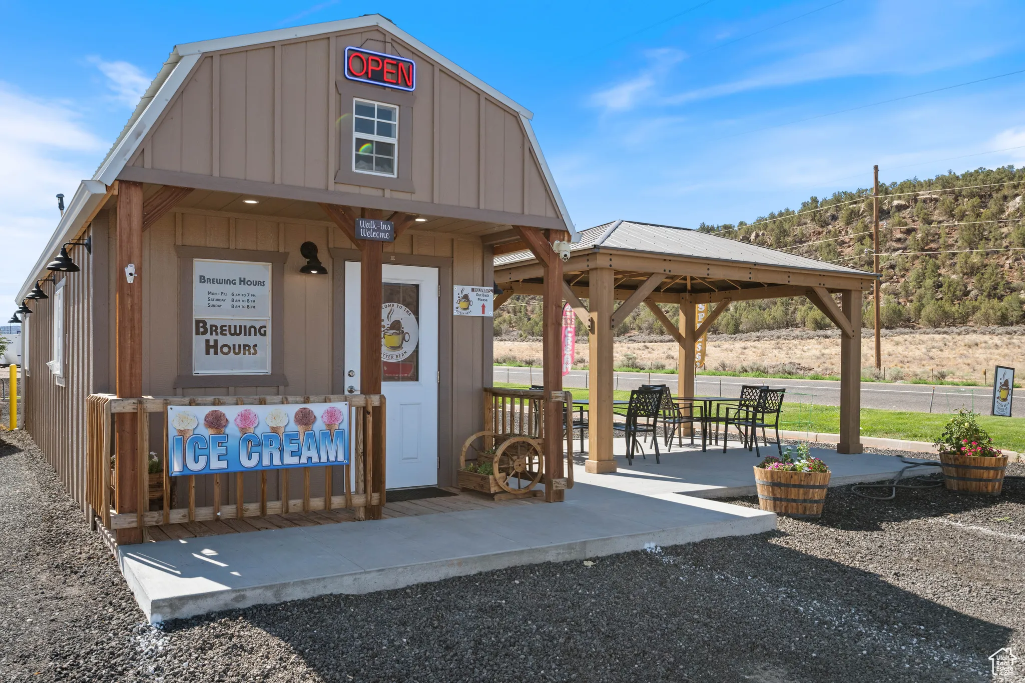View of property's community featuring a gazebo and a patio