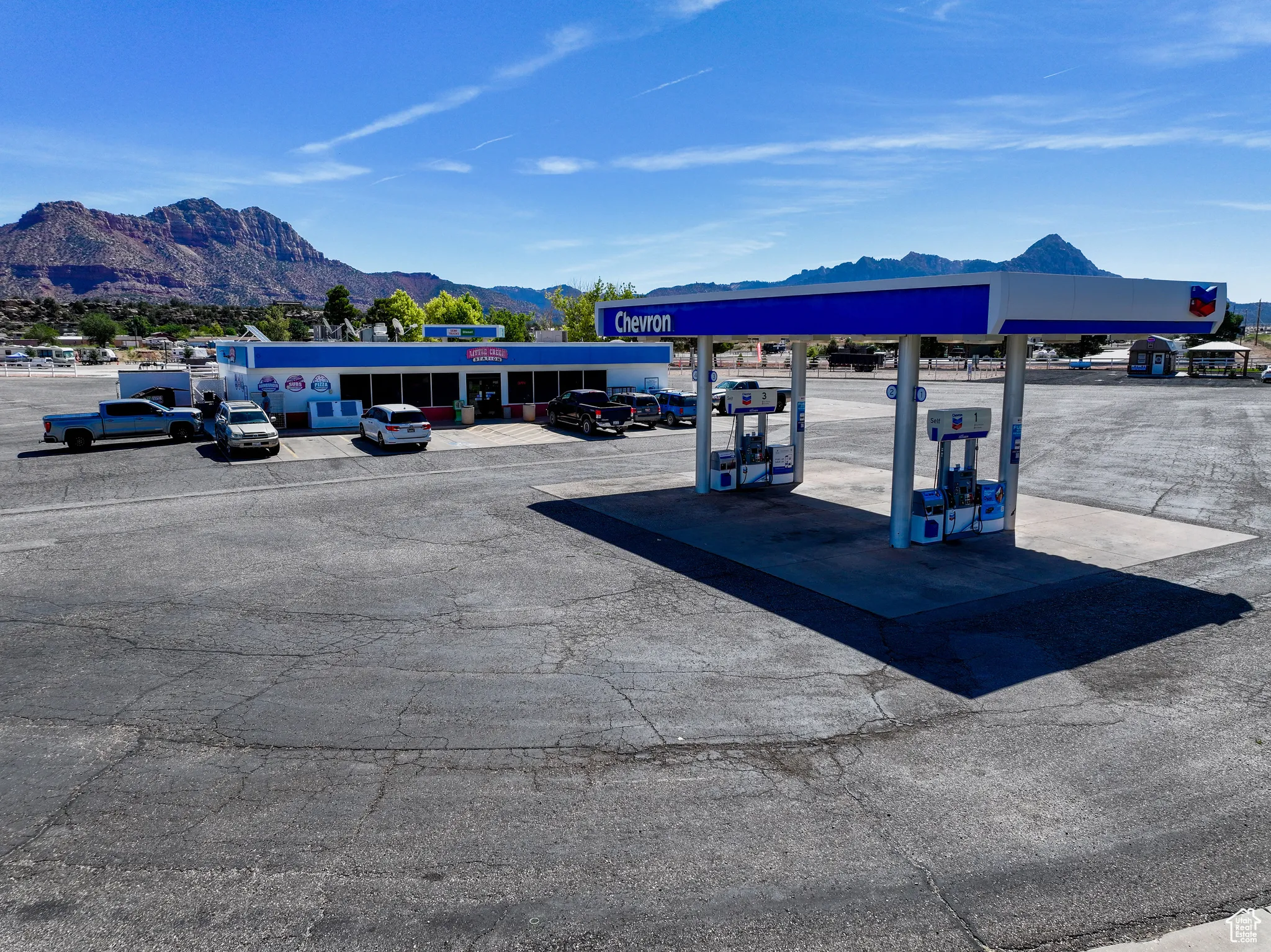 View of vehicle parking featuring a mountain view