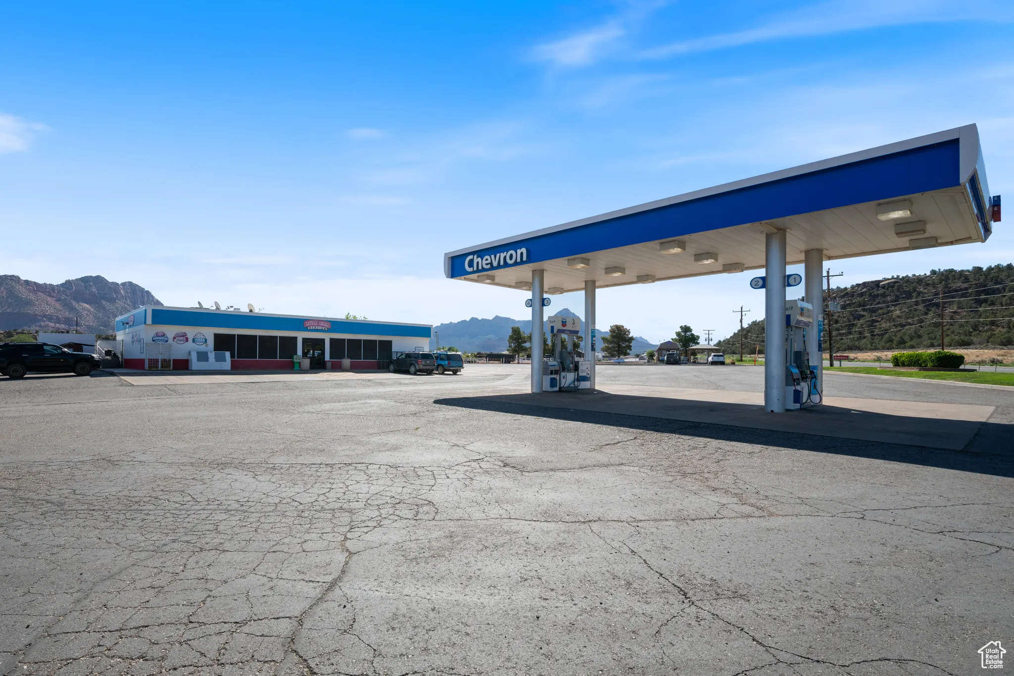 View of car parking featuring a mountain view
