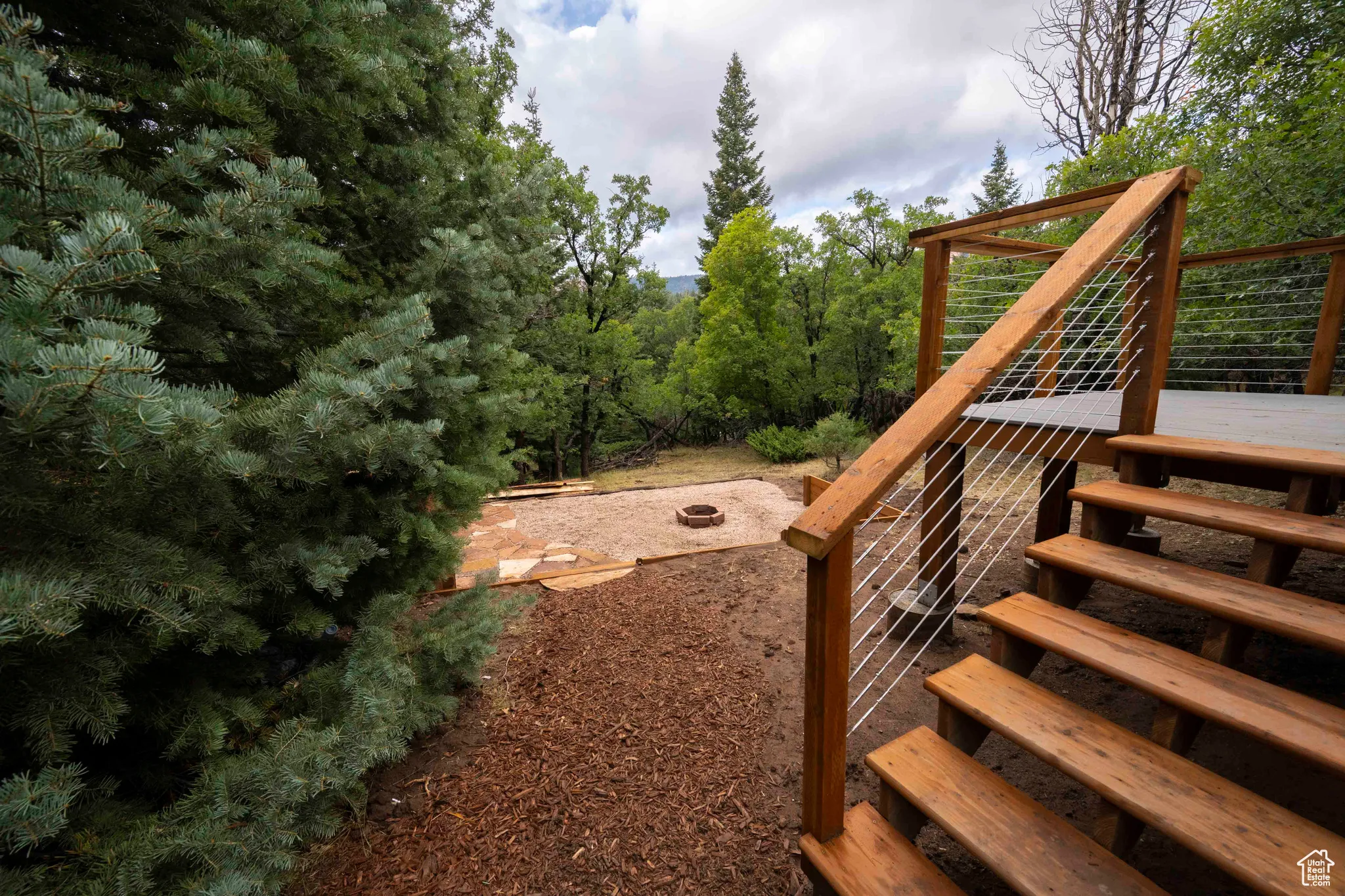 View of yard featuring stairs