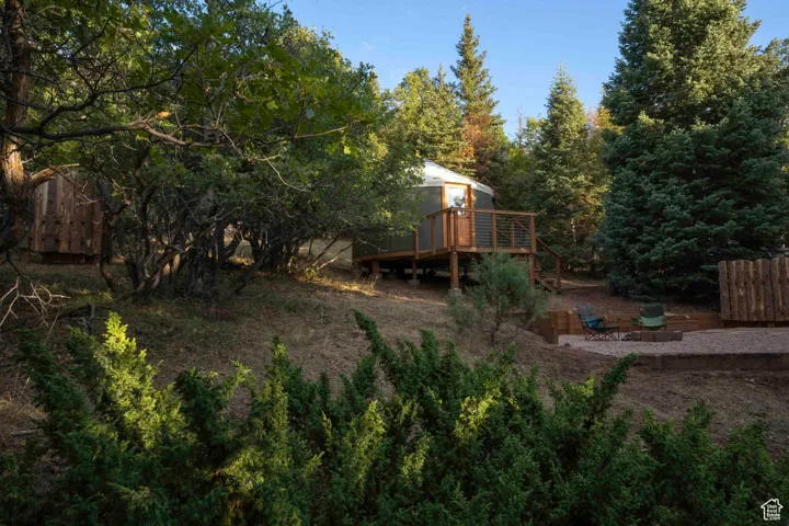 View of yard featuring a deck