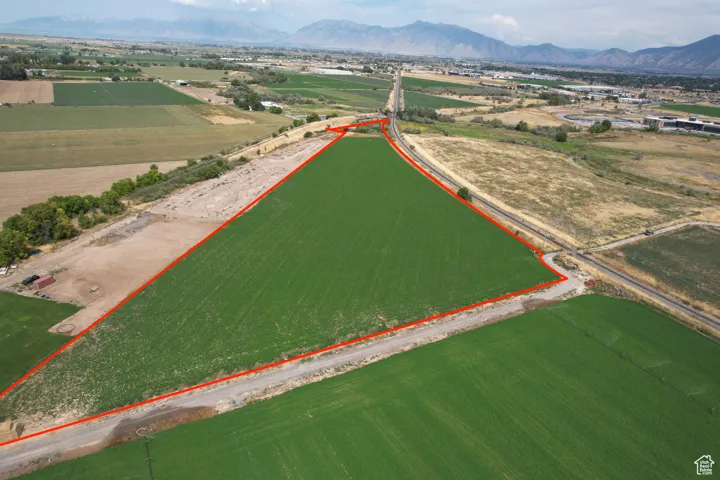 Aerial view of sparsely populated area with mountains and property boundaries highlighted