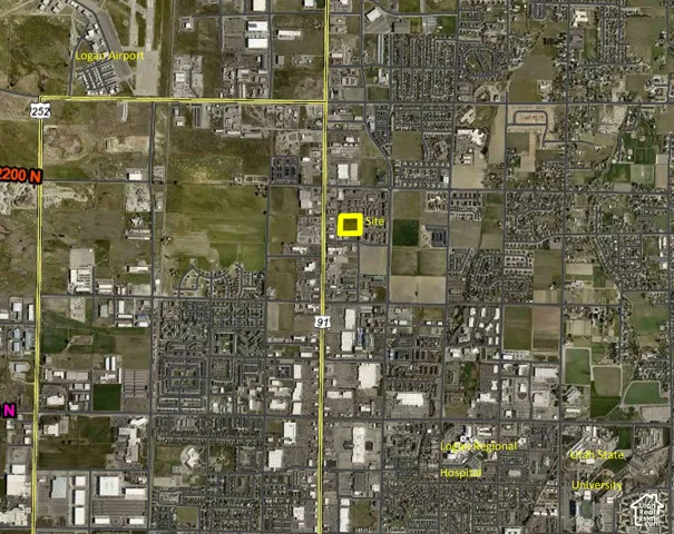 Aerial Map. Illustrating the spatial relationship of the property, designated as "Site," to Logan Airport, Utah State University, and other geographical features