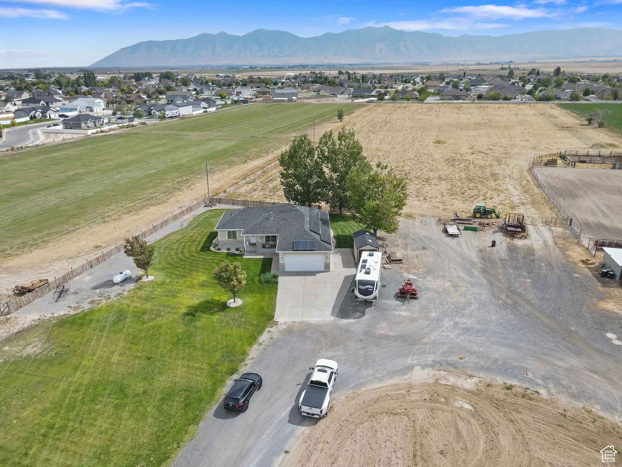 View of subject property featuring a mountain backdrop