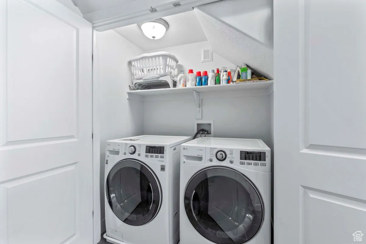 Laundry room with separate washer and dryer