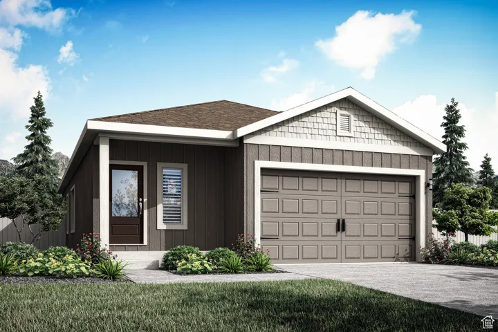 Single story home with driveway, a garage, and a front yard