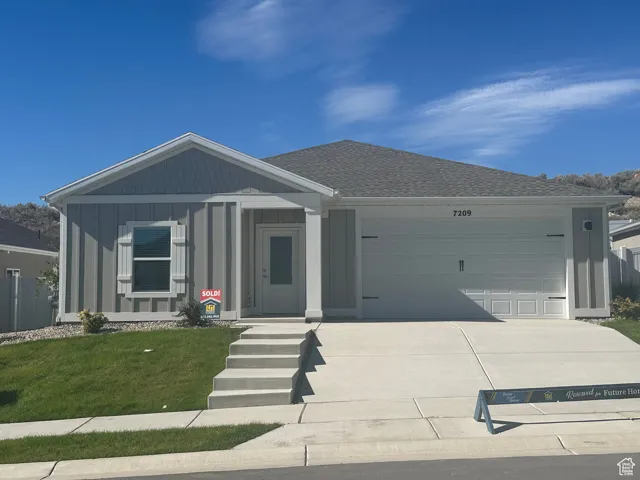 Ranch-style house featuring concrete driveway, a garage, board and batten siding, a shingled roof, and a porch