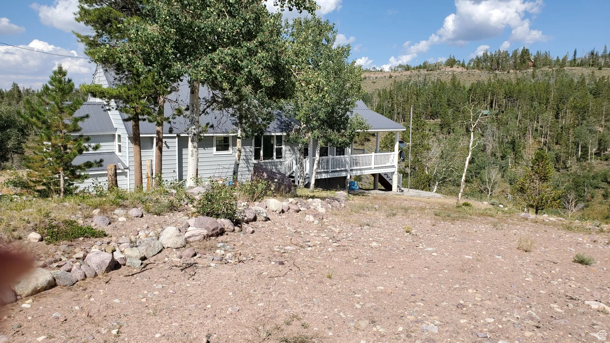 View of front of home featuring a deck