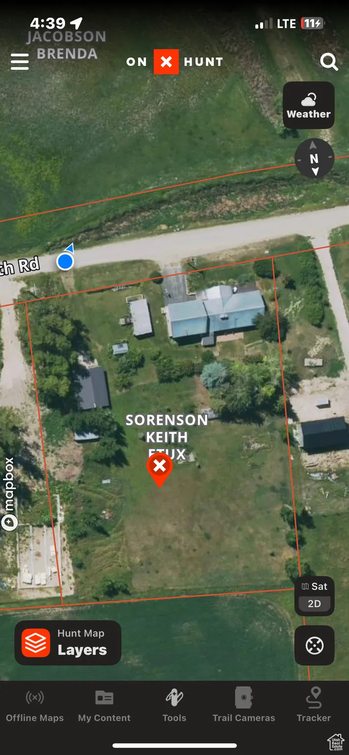 Aerial map of property and surrounding area with property boundaries highlighted