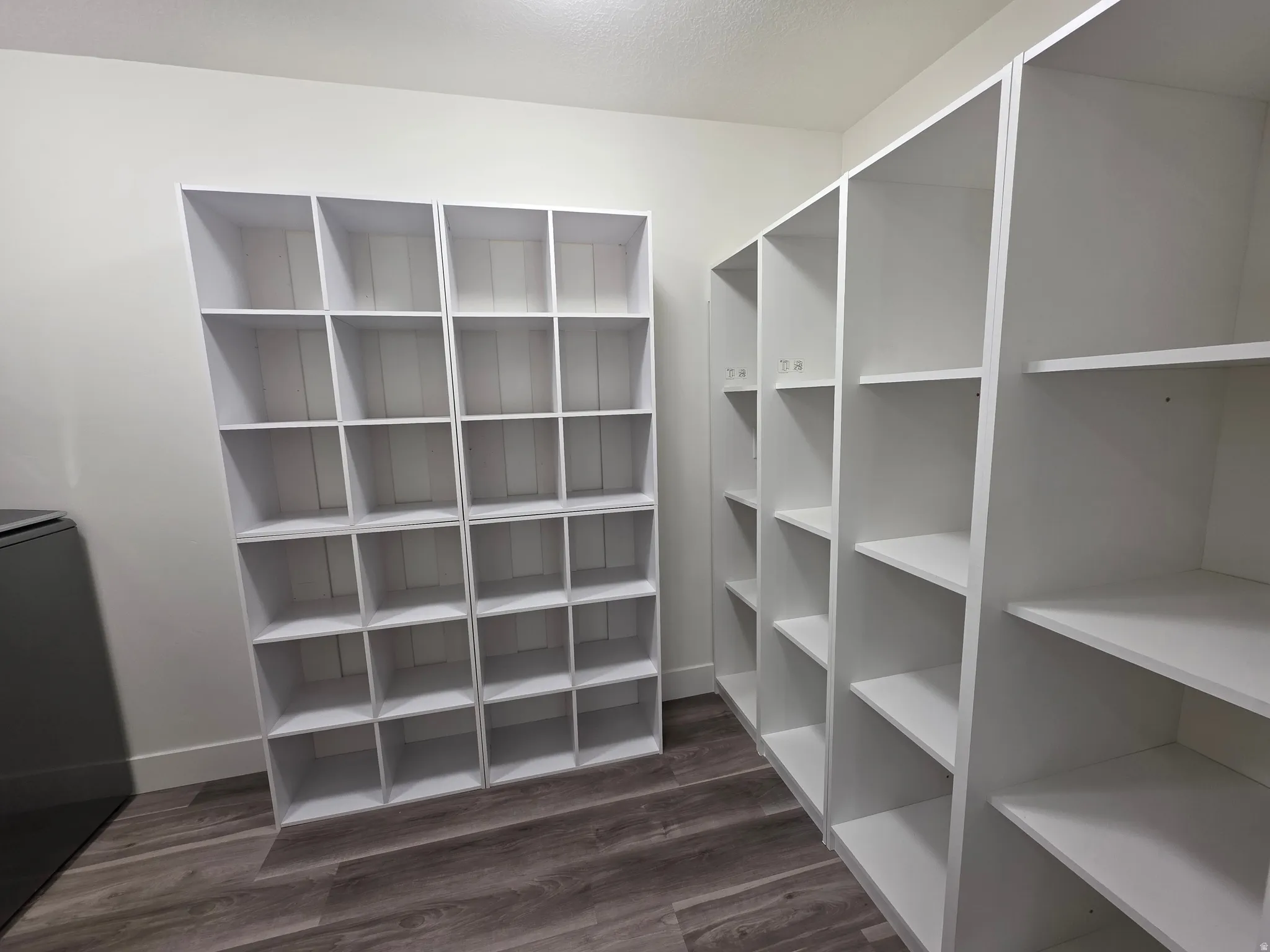 Pantry featuring washer / clothes dryer